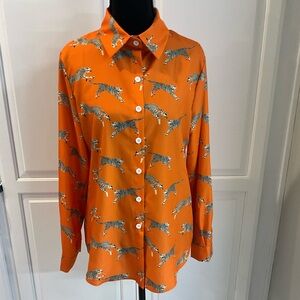 Vibrant Orange Women’s Shirt with Leopard Design